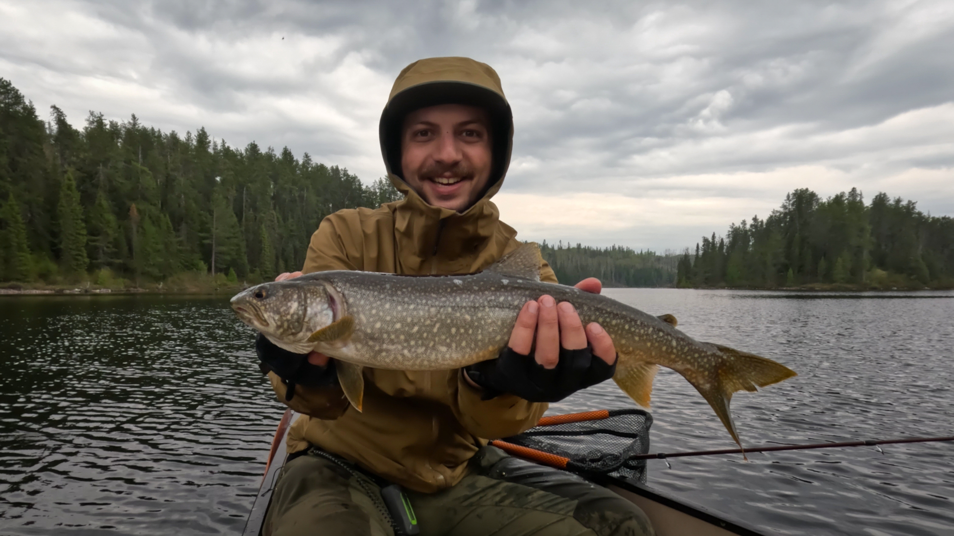 David holding a lake trout